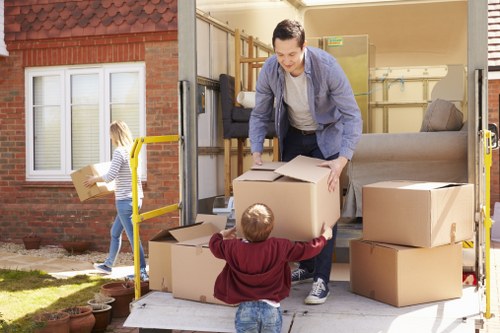 Local furniture pick-up team loading furniture in Streatham