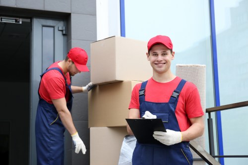 Loading boxes and furniture into a removals van