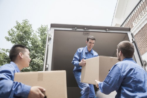 Team handling office furniture and equipment during a Streatham relocation