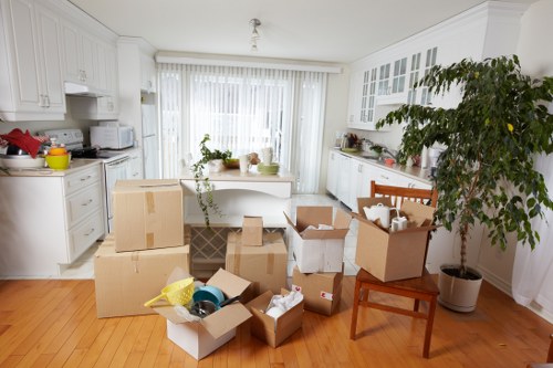Boxes and wrapped furniture arranged for a local move in Streatham