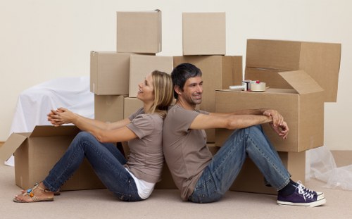 Professional movers handling furniture in Streatham