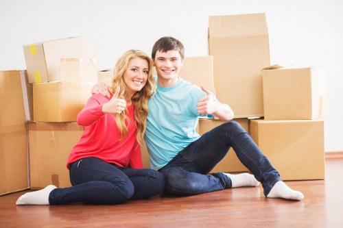 Professional moving truck loaded with packed boxes